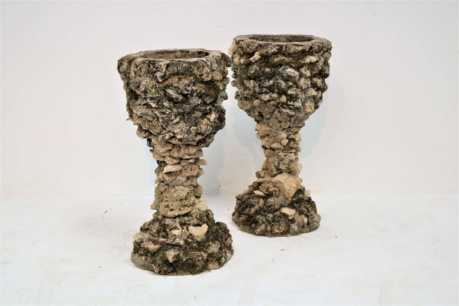 A pair of early 20th century grotto planters/urns