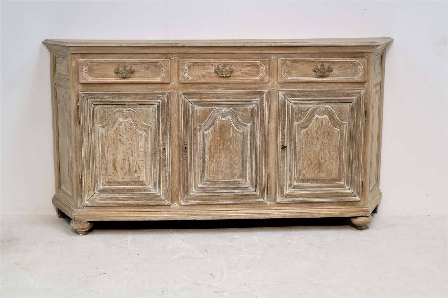 Early 20th century canted corner oak enfilade