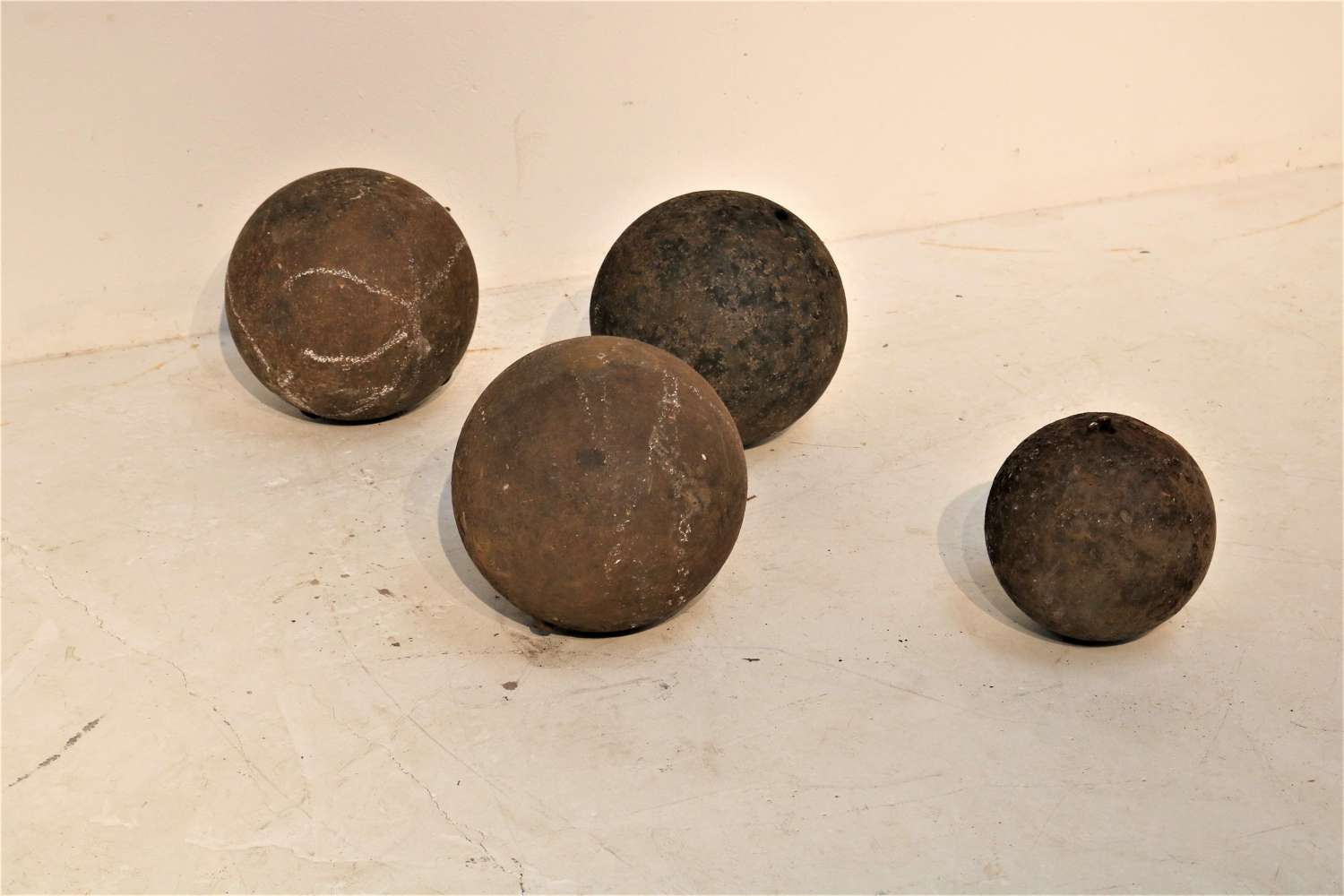 A set of four cast iron English boat weights circa 1900