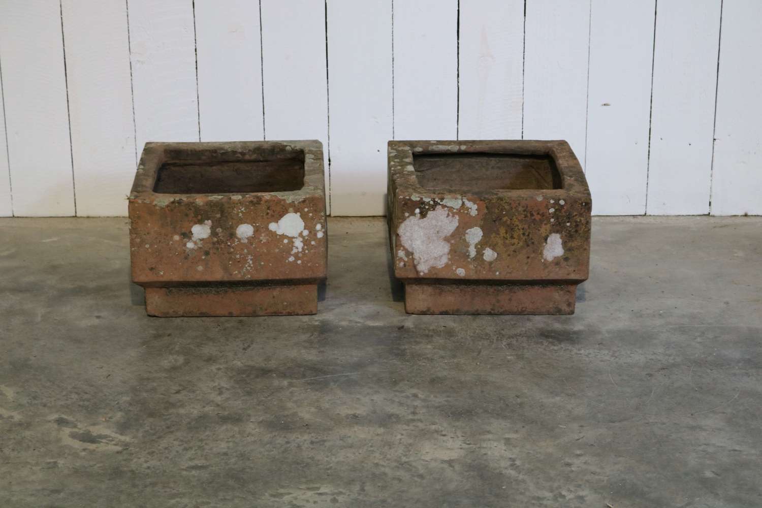 A pair of 20th century terracotta planters
