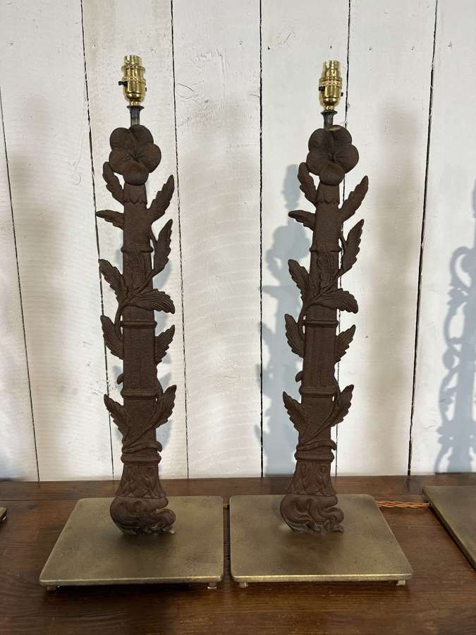 A pair of cast iron lamps made form 19th century components