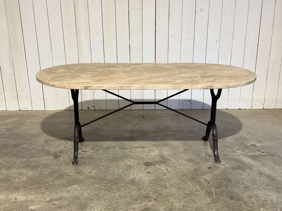 Cast iron based table circa 1900 with later marble top