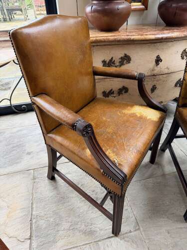 Pair of leather Gainsborough chairs UK 1880