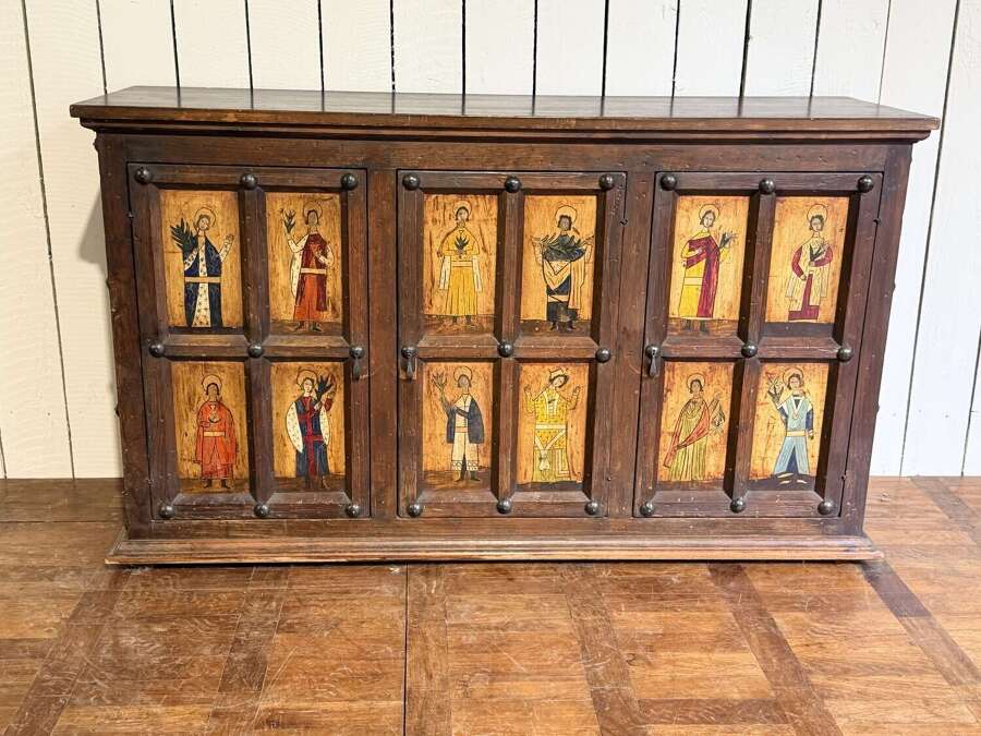 English pine panel side cabinet painted with eclesiastical images