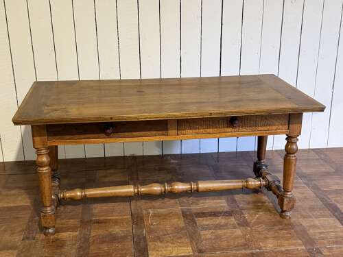 Walnut two-drawer writing table circa 1890
