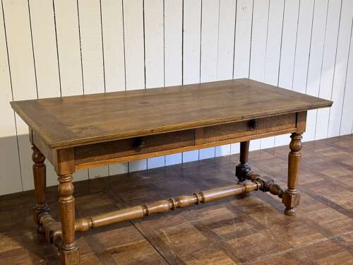 Walnut two-drawer writing table circa 1890